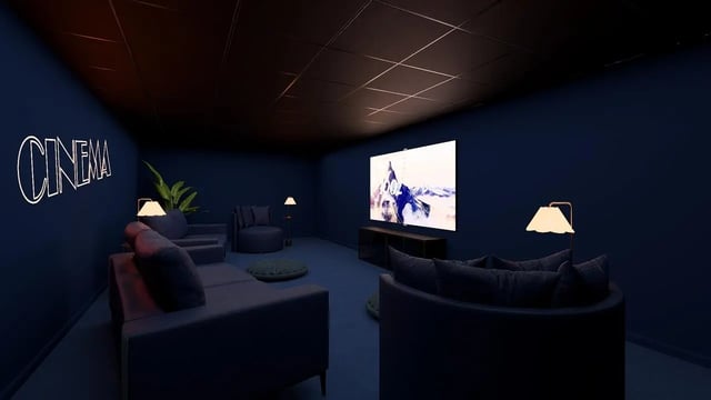 Sofa chairs screen neon sign cinema room at St James Glasgow in Glasgow Student Accommodation