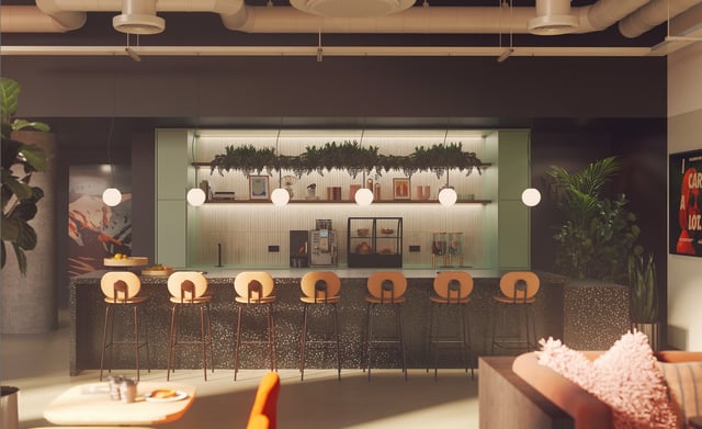 Bar area with stools and kitchen appliances kitchen at Vita Student Gough Street in Birmingham Student Accommodation