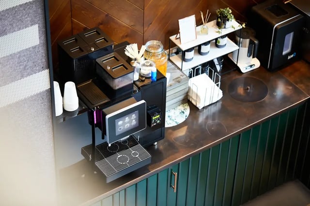 Coffee machine cups napkins and ice machine amenity area at Vita Student St.Albans in Leeds Student Accommodation