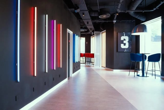 Neon lights hallway with seating area exterior at Vita Student Copper Towers in Coventry Student Accommodation