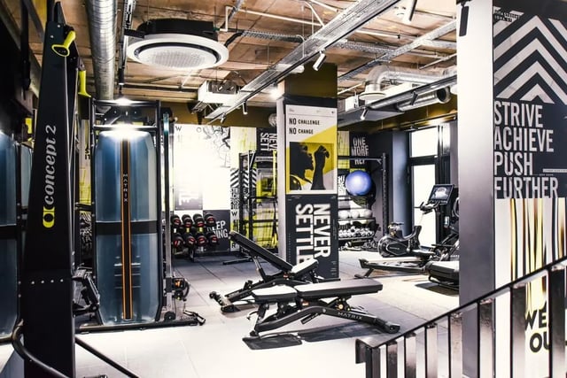 Rowing machines weight benches dumbbells gym. at Vita Student Iona Street in Edinburgh Student Accommodation
