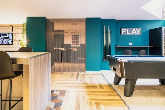 Pool table cues and chairs communal area at Vita Student Portland House - Exeter in Exeter Student Accommodation