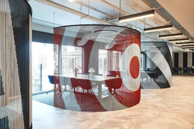 Chic office pods with tables and chairs communal area at Vita Student Cannon Park Warwick in Coventry Student Accommodation