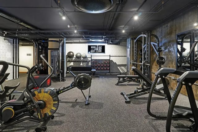 Gym equipment with rowing machine and weights gym at Vita Student Portland Crescent in Leeds Student Accommodation