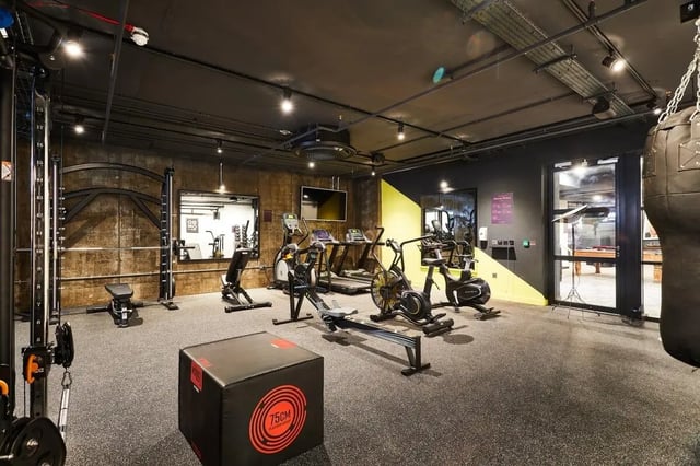 Gym equipment exercise bikes treadmills rowers punching bag gym at Vita Student Portland Crescent in Leeds Student Accommodation