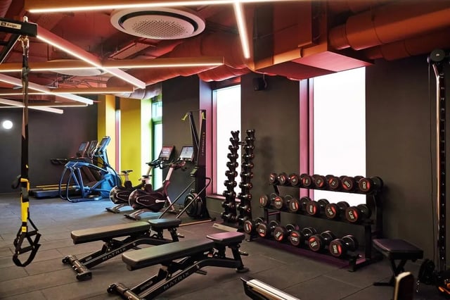 Dumbbells exercise bikes treadmills gym gym at Vita Student Park Place in Cardiff Student Accommodation