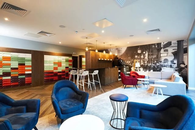 Colorful lockers bar seating lounge area living room at Vita Student Lawrence Street in York Student Accommodation