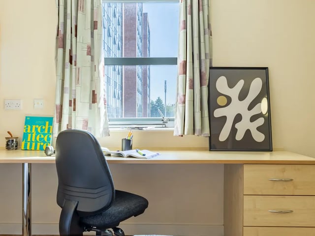 Desk with chair and artwork study area at Europa in Liverpool Student Accommodation