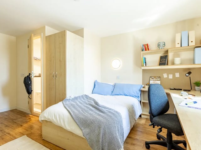 Bed closet desk with chair bedroom at Europa in Liverpool Student Accommodation