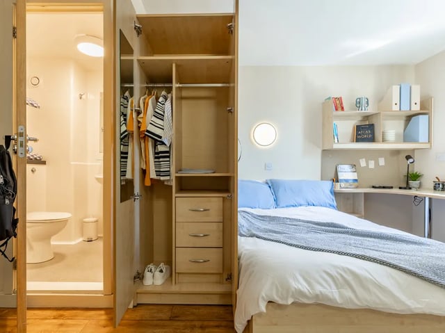 Toilet wardrobe bed desk and shelves bedroom at Europa in Liverpool Student Accommodation
