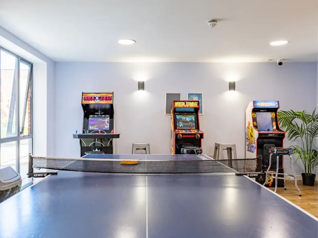 Arcade machines and ping pong table recreational area at Europa in Liverpool Student Accommodation