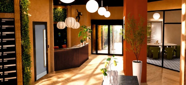 Reception desk plants glass doors dining area interior at Compass in Birmingham Student Accommodation