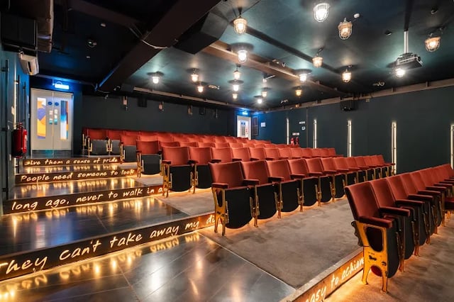 Auditorium with rows of red velvet seating theatre at The Stay Club - Kentish Town in London Student Accommodation