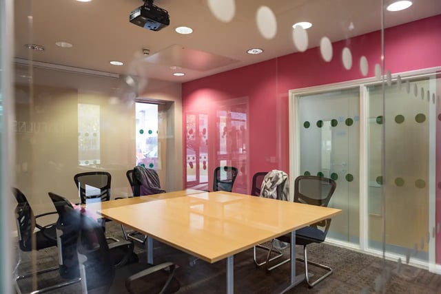Boardroom with chairs table and projector Meeting room at Newport Student Village in Newport Student Accommodation