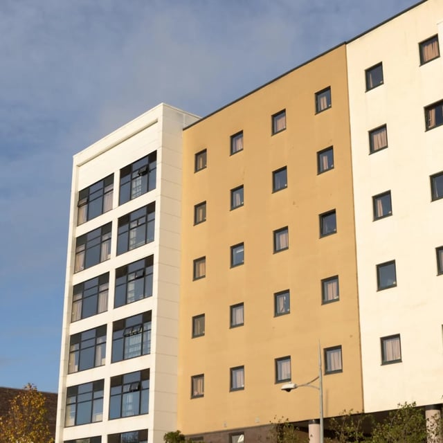 Building with many windows exterior at Newport Student Village in Newport Student Accommodation
