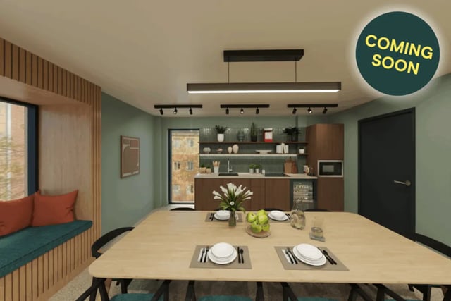 Dining area with kitchen island and seating nook kitchen at St Peters Court in Nottingham Student Accommodation