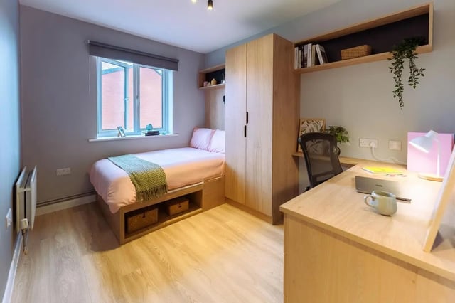 Bed wardrobe desk and chair student bedroom at St Peters Court in Nottingham Student Accommodation