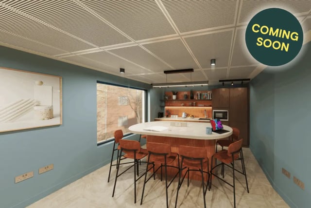 Island kitchen with bar stools and cabinets kitchen at St Peters Court in Nottingham Student Accommodation