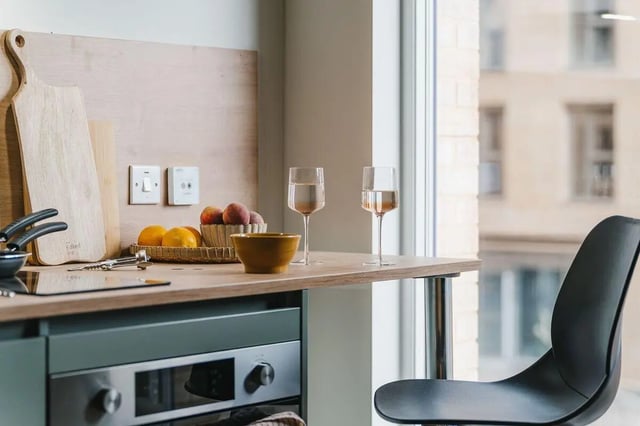 Countertop with fruit and wine glasses kitchen at City Wharf in Glasgow Student Accommodation