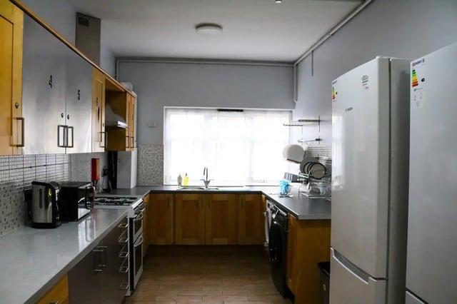 Kitchen with appliances counter and cabinets kitchen at 42 Disraeli Rd E7 9JP in London Student Accommodation