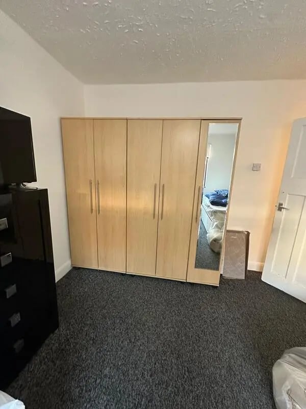 Wardrobe dresser and bed Bedroom at E16 3LL, MacGregor Rd, London in London Student Accommodation