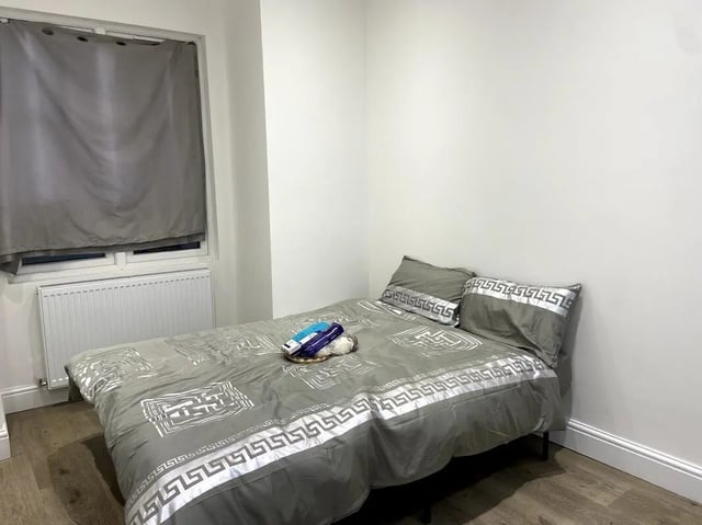 Bed with grey patterned bedding and pillows Bedroom at E7 8PF, Shaftsbury Rd, London in London Student Accommodation