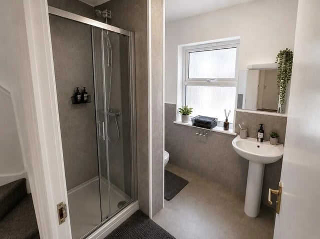 Shower sink toilet and window modern bathroom at Parham Student Village in Canterbury Student Accommodation