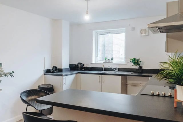 Modern student kitchen with breakfast bar and appliances kitchen at Park Village in Sheffield Student Accommodation