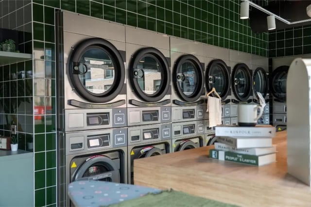 Washing machines and dryer stack laundry room at Fusion Students Nottingham in Nottingham Student Accommodation