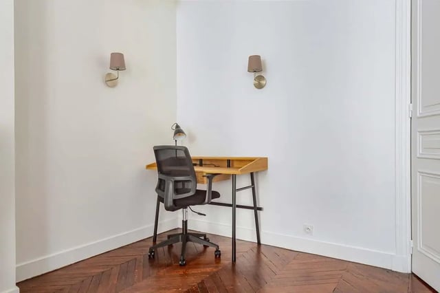 Desk chair lamp wall sconces study area at Apartment in 2 Rue de Miromesnil, 75008 Paris, France in Paris Student Accommodation