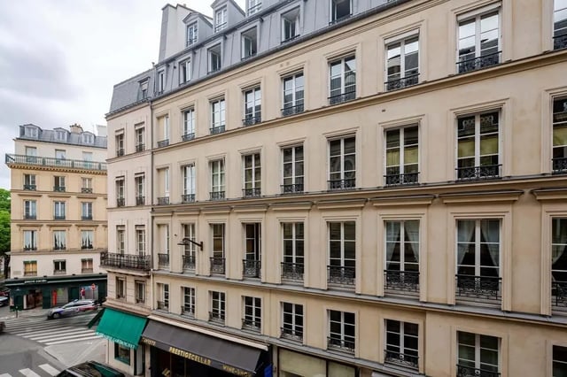 Cream building facade with multiple windows exterior at Apartment in 2 Rue de Miromesnil, 75008 Paris, France in Paris Student Accommodation