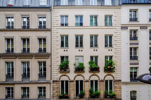 Apartment building with balconies plants and windows exterior at Apartment in 2 Rue de Miromesnil, 75008 Paris, France in Paris Student Accommodation