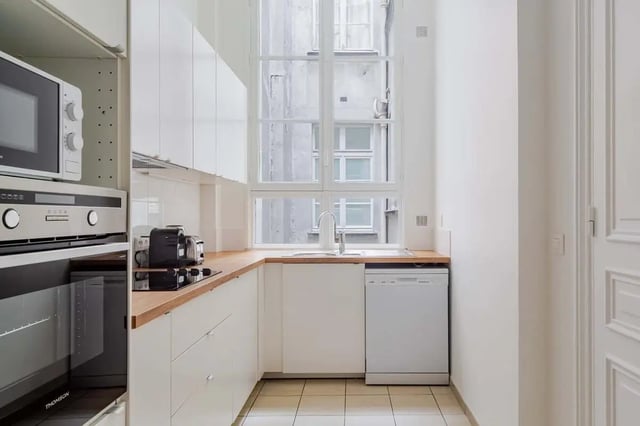 Microwave oven dishwasher cabinets and toaster kitchen at Apartment in 2 Rue de Miromesnil, 75008 Paris, France in Paris Student Accommodation