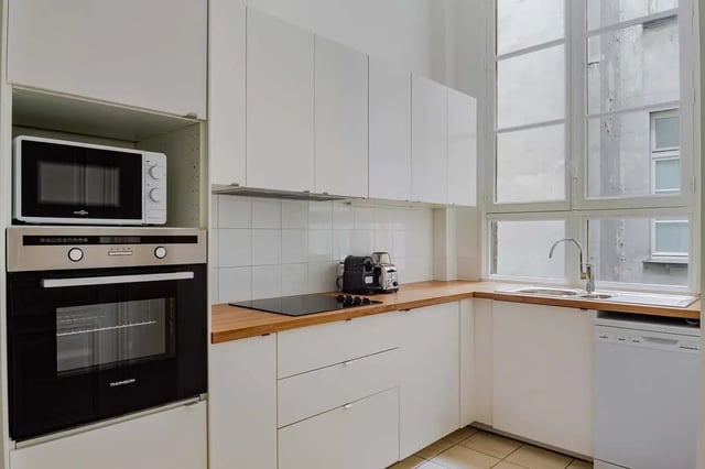 Microwave oven hob sink dishwasher kitchen at Apartment in 2 Rue de Miromesnil, 75008 Paris, France in Paris Student Accommodation
