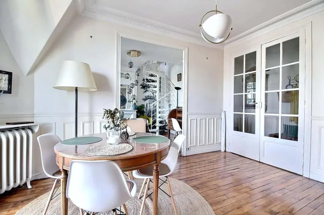Dining table with chairs and lamp living room at Apartment in Rue Régis, 75006 Paris, France in Paris Student Accommodation