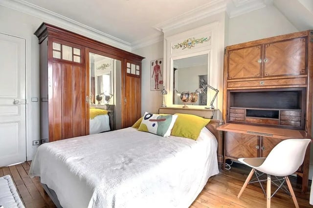 Wardrobe bed desk and chair bedroom at Apartment in Rue Régis, 75006 Paris, France in Paris Student Accommodation