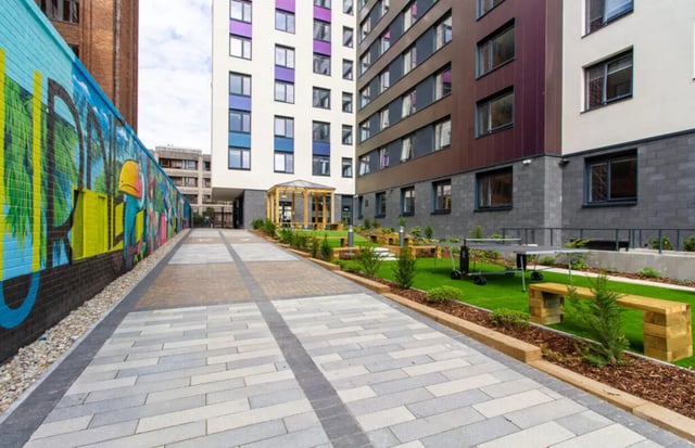 Graffiti wall ping pong table benches outdoor area at Skyline in Bournemouth Student Accommodation
