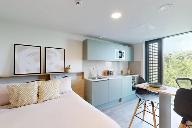 Bed kitchen with art and dining table studio at Burnsall House in Coventry Student Accommodation