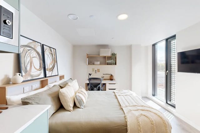 Bed desk artwork and large window bedroom at Burnsall House in Coventry Student Accommodation