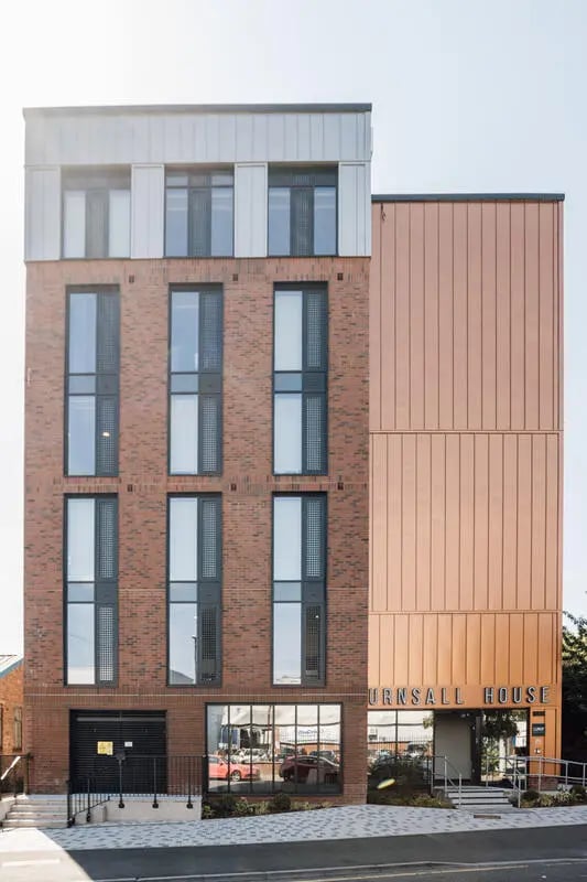 Brick building with copper siding URNALL HOUSE exterior at Burnsall House in Coventry Student Accommodation