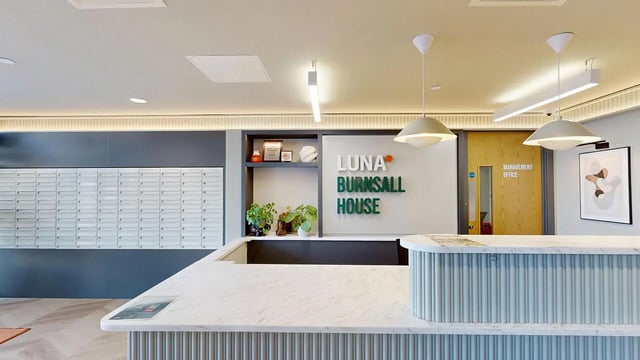 Mailboxes reception desk and artwork lobby at Burnsall House in Coventry Student Accommodation
