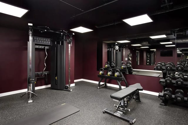 Gym equipment including weights bench and mat Gym area at Burnsall House in Coventry Student Accommodation