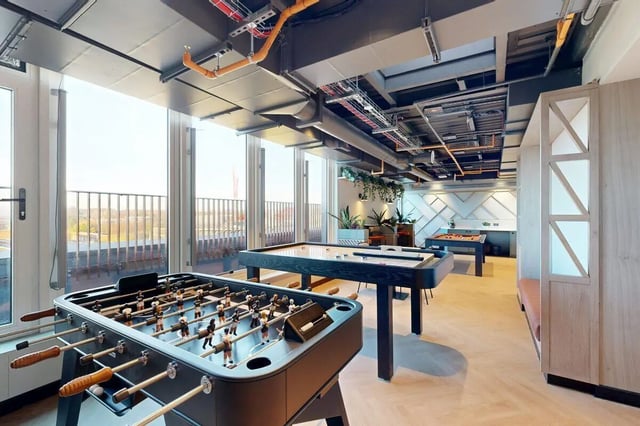 Foosball table shuffleboard pool table lounge area at Bridgeside in Nottingham Student Accommodation