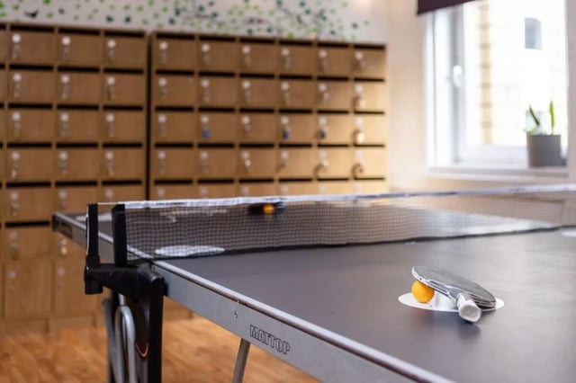 Ping pong table with racket and balls playing area at Cranborne House in Bournemouth Student Accommodation
