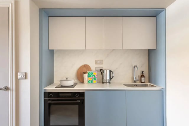 Modern kitchen with oven sink kettle and cabinets kitchen at Hamilton House in Brighton Student Accommodation