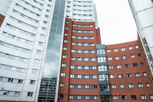 Modern brick and white buildings with many windows Exterior at Belgrave View in Birmingham Student Accommodation