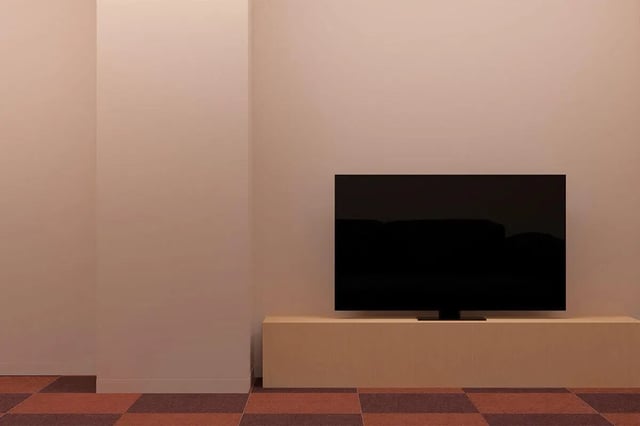 Television on stand floor area living room at Studeo by UniLodge in Melbourne Student Accommodation