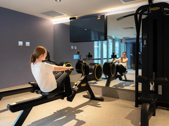 Rowing machines and mirror Gym area at The Switch Lachlan Macquarie Park in Sydney Student Accommodation