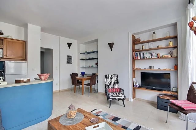 Kitchen dining area living room with television at Apartment in Rue Bergère, 75009 Paris, France in Paris Student Accommodation