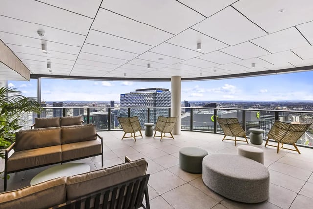 Sofa chairs stools and tables on balcony exterior at West Tower, Melbourne Quarter in Melbourne Student Accommodation